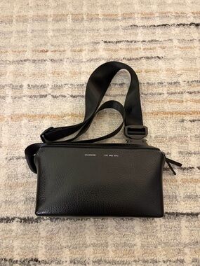 Grams28 157 Essential Sling in Black Pebbled Leather